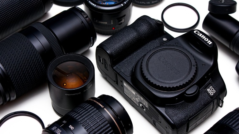 a Canon DSLR camera and some lenses