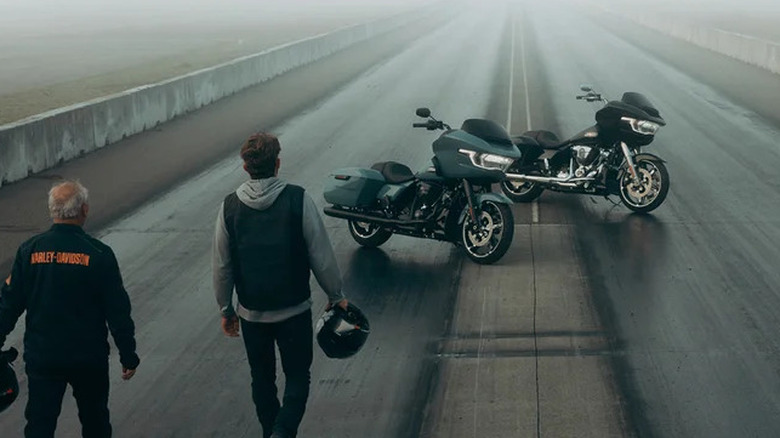 Riders approaching Harley-Davidson Road Glide motorcycles