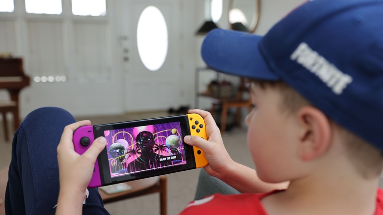 Kid playing Fortnite Nintendo Switch