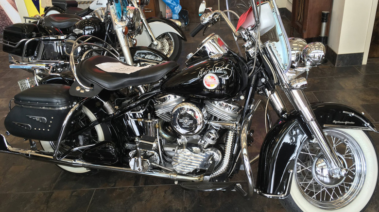 Harley-Davidson Ultra Glide Elvis SIgnature Edition parked on on showroom floor with other Harley-Davidson motorcycles