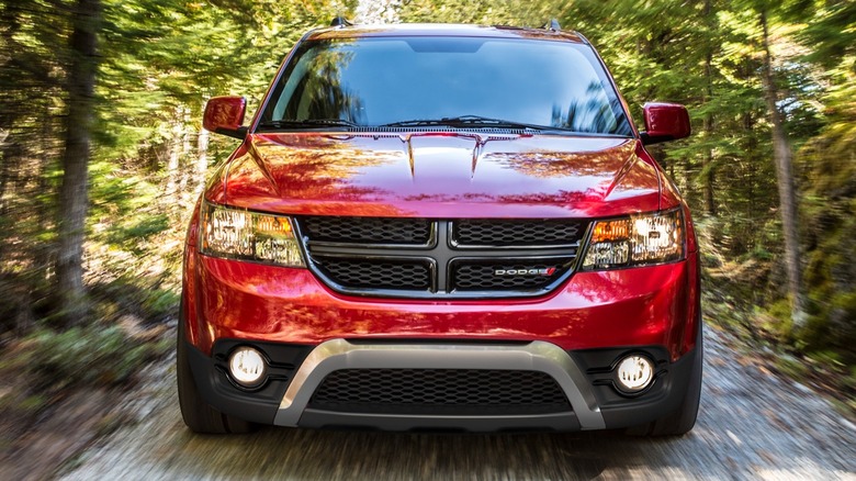 a red 2019 Dodge Journey Crossroad