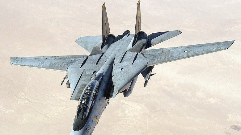 F-14 Tomcat flying over Persian Gulf area desert