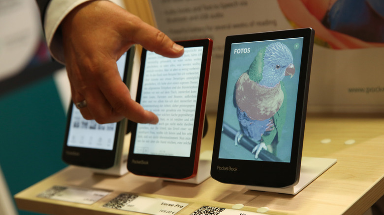 person touching a PocketBook ereader