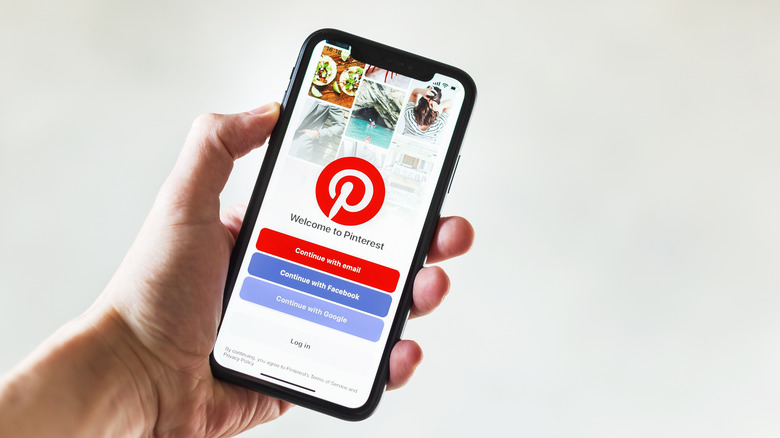 phone with pinterest app open