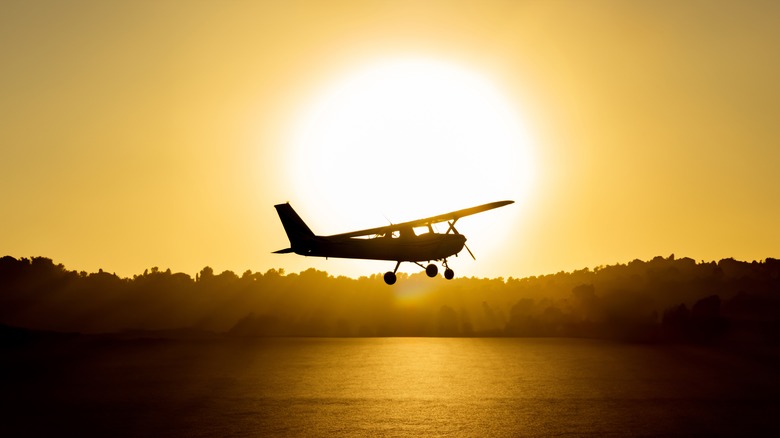 Cessna silhouetted in sunset