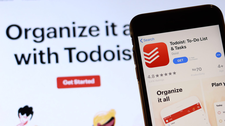 Todoist iPhone app with website in background