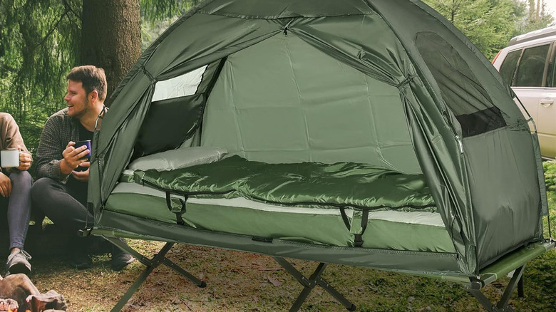 people sitting by Outsunny camping cot