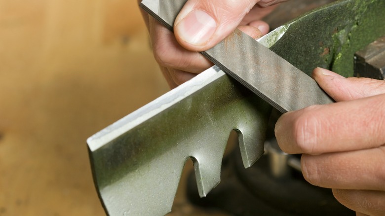 metal file sharpening lawn mower blade