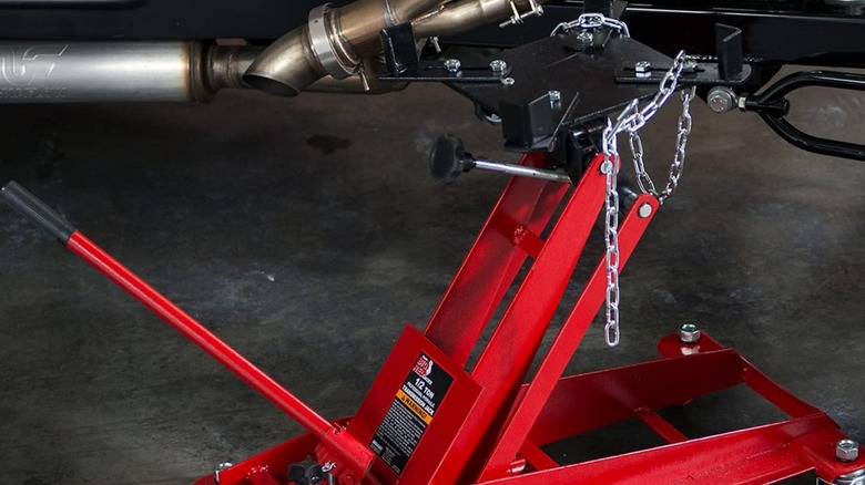 big red roll under transmission jack