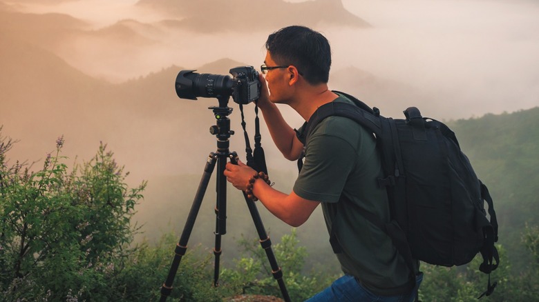 photographer using tripod