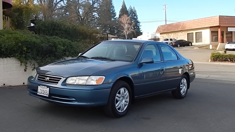 Camry parked next to wall