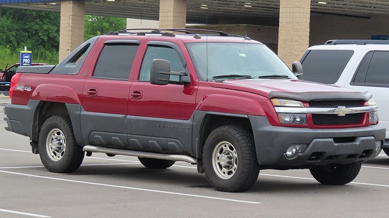 red Chevrolet Avalanche truck