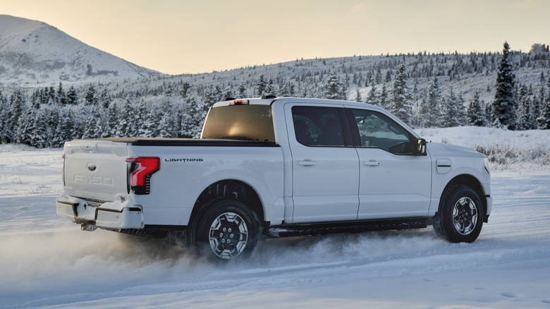 Ford F-150 Lightning  on snowy mountain road