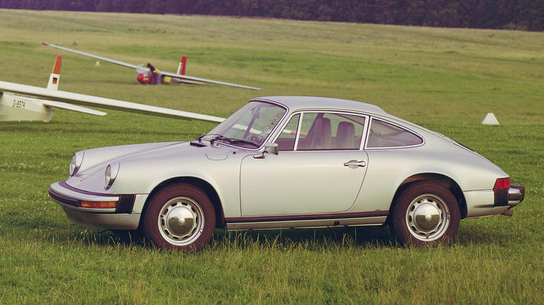 Porsche 912e parked in grass