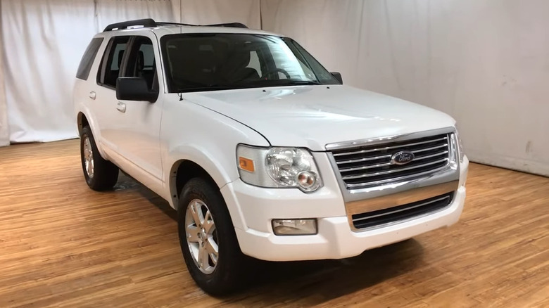 Ford Explorer in empty room