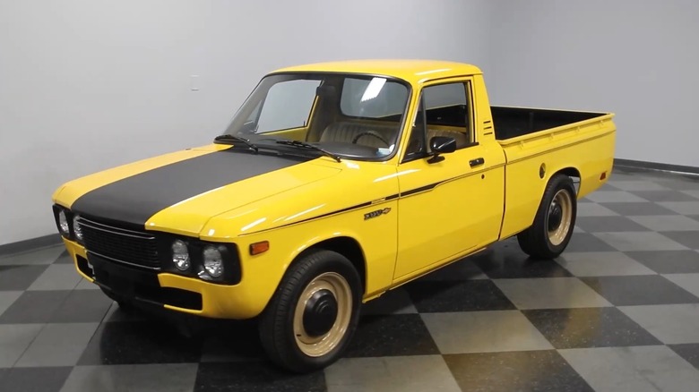 1972 Chevy LUV parked showroom