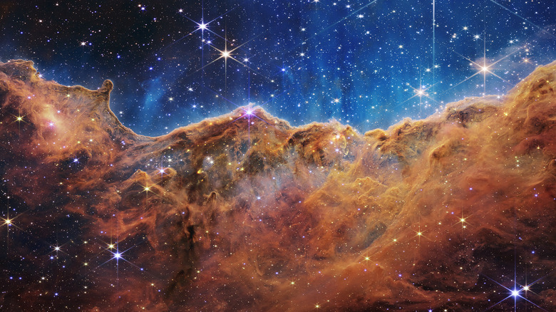 composite photo of Carina Nebula Cosmic Cliffs