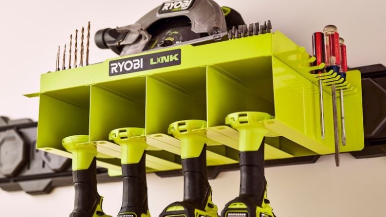 Ryobi tool organizer with hanging power tools and screwdrivers