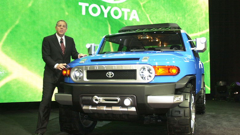 Man revealing FJ Cruiser concept car