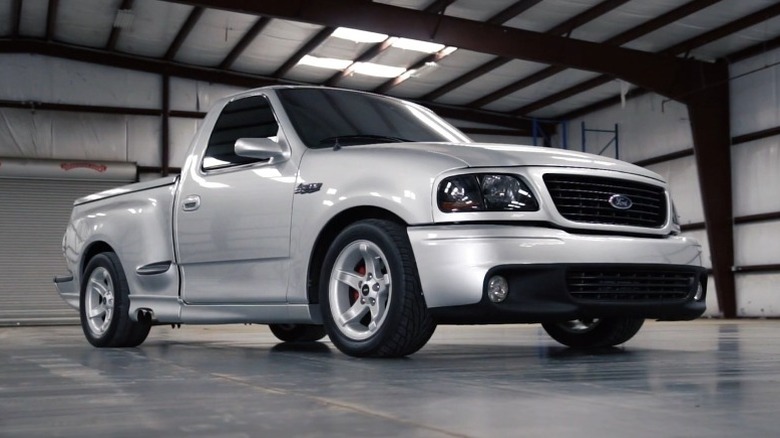 Front 3/4 shot of a Ford SVT F-150 Lightning parked in the garage