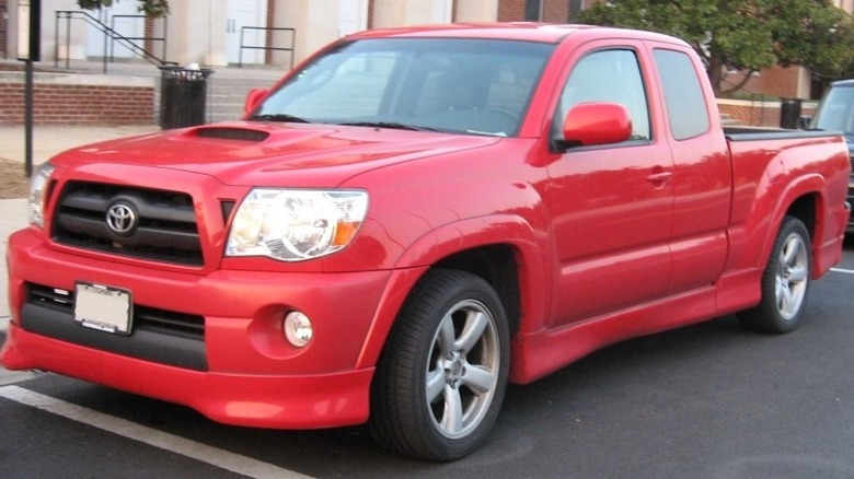 2005-2007 Toyota Tacoma parked on the roadside in front of a building