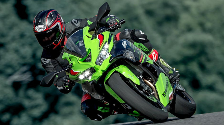 Person riding Kawasaki ZX-4RR KRT