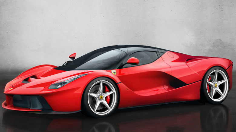 A driver's side view of the red Ferrari LaFerrari