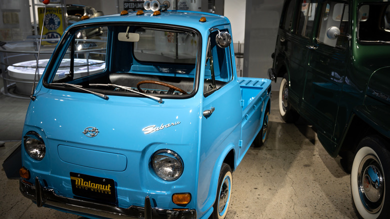 Blue Subaru Sambar in garage