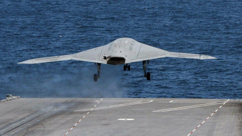 An X-47B Unmanned Combat Air System (UCAS) demonstrator launches from the flight deck of the aircraft carrier USS George H.W. Bush (CVN 77) May 14, 2013 in the Atlantic Ocean