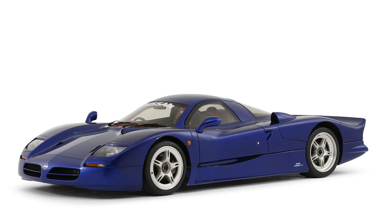 Blue 1998 Nissan R390 GT1 on white background