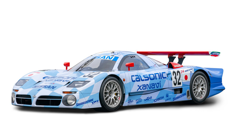 Front 3/4 view of Nissan R390 GT1 #32 race car, 1998 Le Mans third place overall finisher