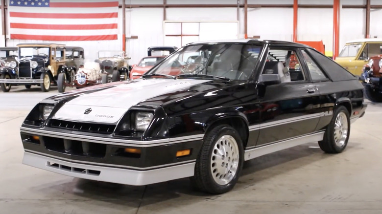 A black 1985 Dodge Shelby Charger