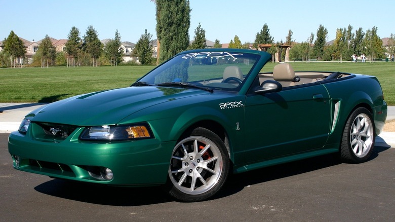 Green convertible 99 Mustang