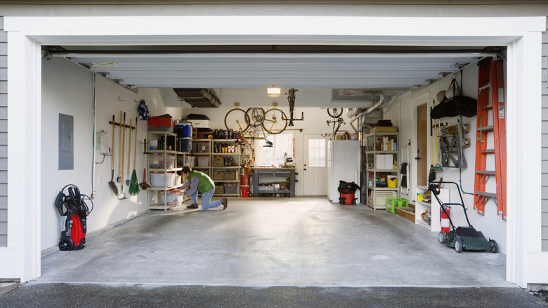 Man straightening up his garage