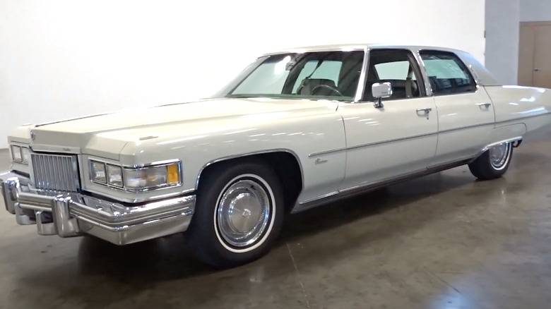 Cadillac Fleetwood 75 on display in garage