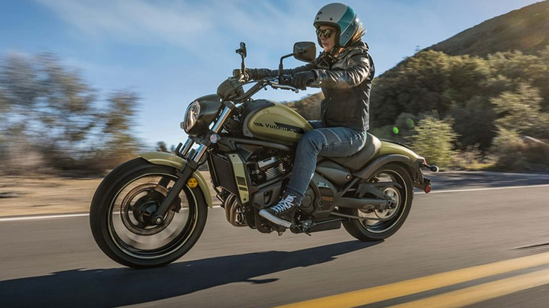 person riding kawasaki vulcan s