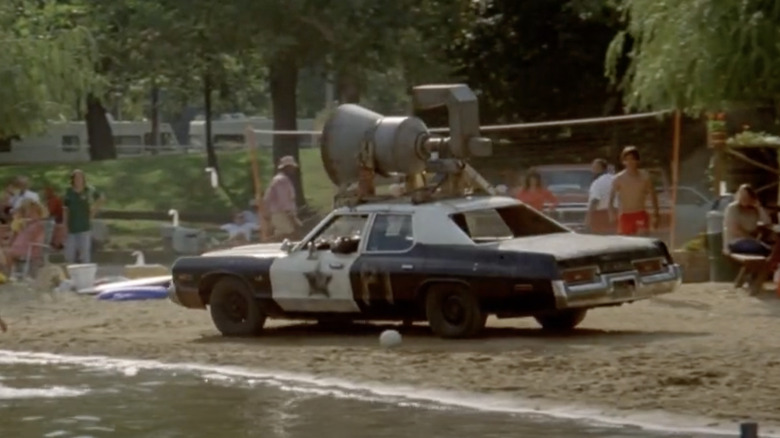 Bluesmobile driving along the beach