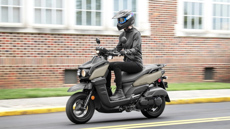 person riding zuma 125 motorcycle