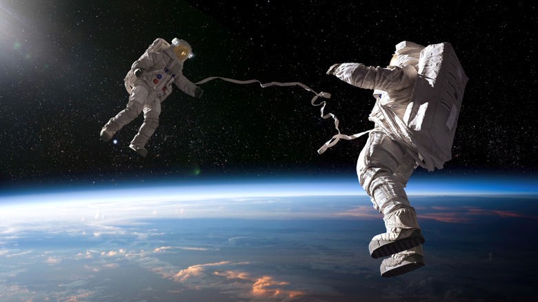 Two astronauts on a spacewalk