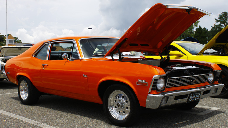 Orange Chevy Nova SS parked