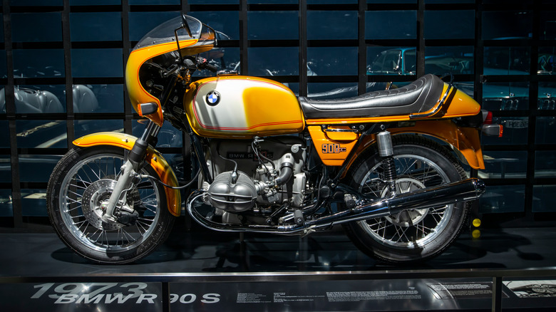 BMW R90S parked showroom