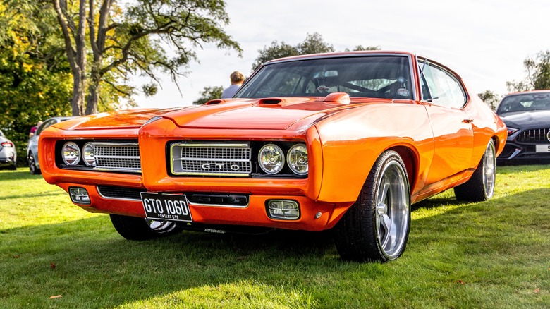 Orange Pontiac GTO Judge parked