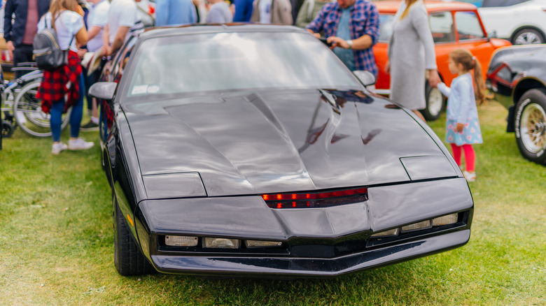 Black 1982 Pontiac Trans Am parked