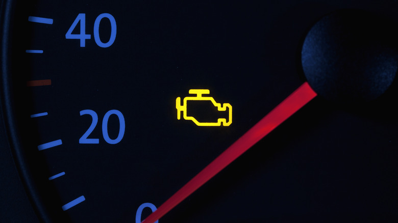 yellow check engine symbol in speedometer