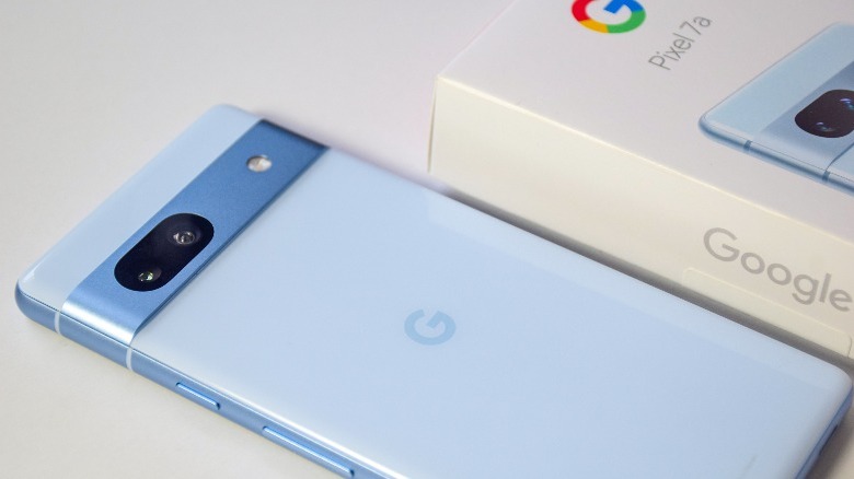 An unboxed blue Google Pixel 7a