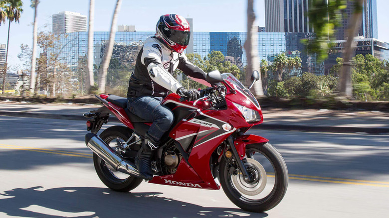 person riding Honda CBR300R motorcycle