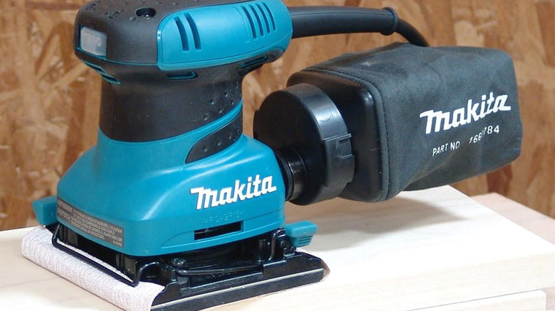 makita sander on top of wood