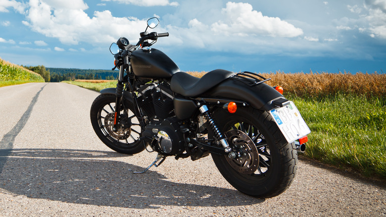 Sportster 883 parked on road