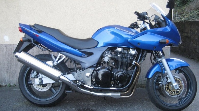 The Kawasaki ZR-7S motorcycle parked in front of a building