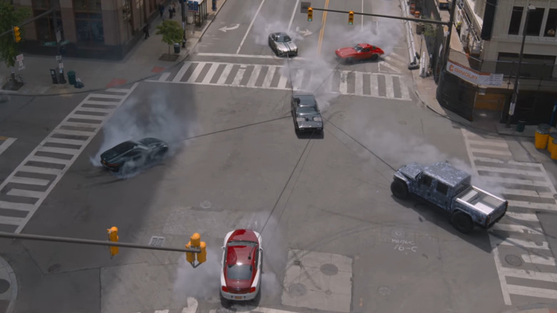 A car chase from The Fate of the Furious involving six cars and ropes